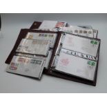 Four Royal Mail First Day Cover albums containing covers from 1984 to 2003