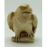 Japanese Meiji period Japanese ivory model of a eagle, signed, 4cm tall
