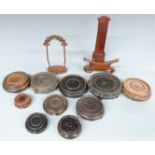 A collection of Chinese hardwood stands including some with carved/pierced decoration, largest 24cm