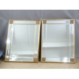 A pair of bevelled glass mirrors, W115 x D86
