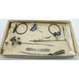 A collection of 19thC Chinese white metal jewellery including hat pins, bangle, hair pins, hair