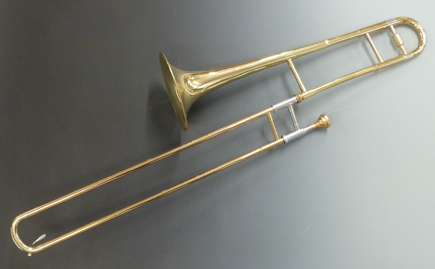 Blessing Scholastic Elkhart USA brass and plated trombone, serial no 257719 with Denis Wick London - Image 2 of 3