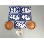 Five French enamel house numbers,10 x 15cm, two copper advertising pin dishes for Royal Exchange