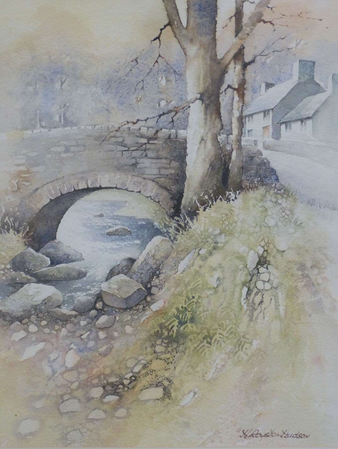 H Royston Hudson watercolour village scene with bridge over stream, 42 x 32cm, framed and glazed