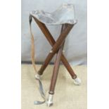 Dark wood shooting stool with metal feet