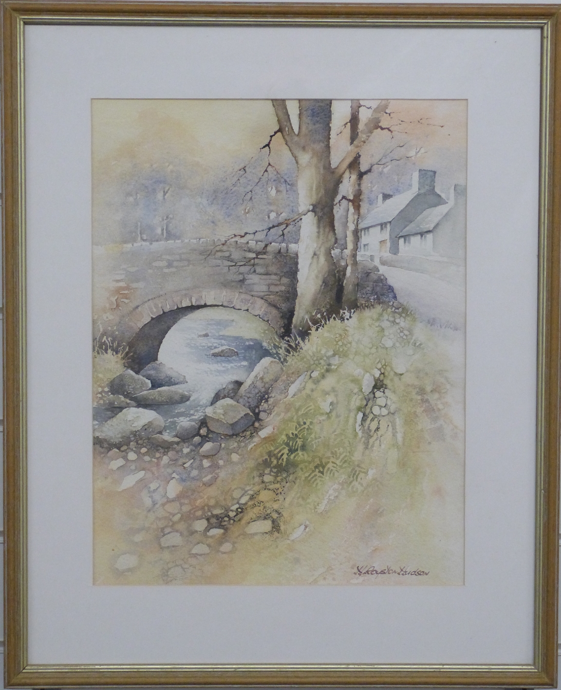 H Royston Hudson watercolour village scene with bridge over stream, 42 x 32cm, framed and glazed - Image 2 of 3