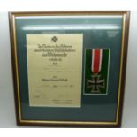 German Third Reich Nazi Iron Cross medal, framed and mounted with certificate