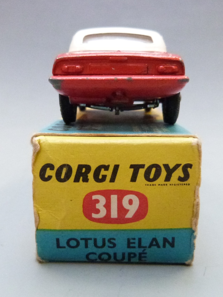 Corgi Toys diecast model Lotus Elan Coupe with red body, white top, white interior, cast hubs and - Image 3 of 5