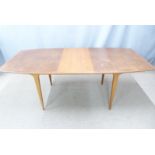 A retro McIntosh shaped table, W153 D91 H74cm