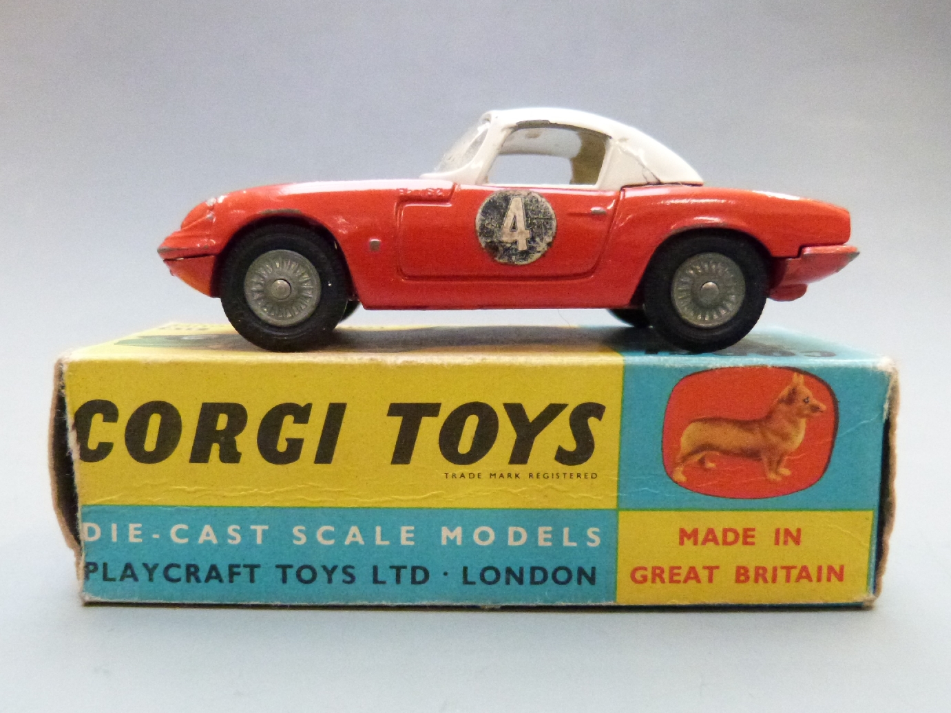 Corgi Toys diecast model Lotus Elan Coupe with red body, white top, white interior, cast hubs and - Image 4 of 5