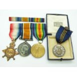 British Army WWI medals comprising 1914/1915 Star, War Medal and Victory Medal named to 2412 Pte E J