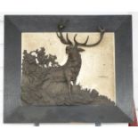 A bronze/spelter relief of a stag, W38 H38cm