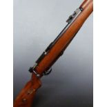 Mauser .22 bolt-action rifle with semi-pistol grip, leather sling, adjustable sights and 26 inch