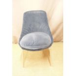 A chrome framed upholstered chair