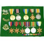 A mounted medal display comprising British Army WWI Military Medal and Victory Medal named to