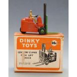 Dinky Toys diecast model Coventry Climax Fork Lift Truck with orange body, black boom and green
