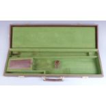 Brown faux leather shotgun case with fitted interior, 76x22x8.5cm.