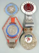 Four car badges including National Trust for Scotland, Safety Courtesy, Caravan Club and Wales