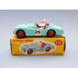 Dinky Toys diecast model Triumph TR2 Sports with mint green body, red interior and hubs, white