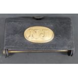 American Civil War era leather catridge pouch with brass fittings including NJ badge to front