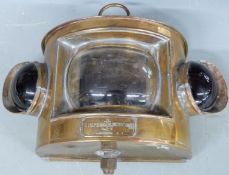 Simpson Lawrence ship's lamp with central clear lens flanked by coloured bullseye lenses, width