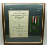 German Third Reich Nazi War Merit Cross with Swords medal, framed with certificate