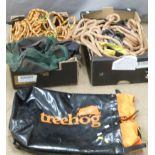 Two boxes of tree surgeon's ropes with carabiners, pulleys and a 'Treehog' knapsack bag