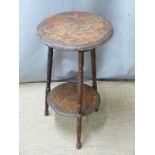 A cricket table with carved/pokerwork top, diameter 37 H60cm