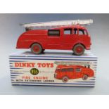 Dinky Toys diecast model Fire Engine with Extending Ladder and red body and hubs, 955, in original