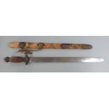 Oriental short sword, with carved wooden handle, metal fittings and scabbard, blade length 45cm,