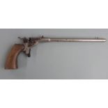 Deactivated percussion hammer action .22 pistol with plated body, shaped wooden grips and 9 inch