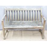 A hardwood garden bench, W122cm