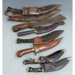 A collection of kukris, machetes etc, longest 50cm
