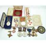 A group of British Red Cross and other medals and a Civil Defence Long Service Medal with sundry