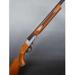 BSA 20 bore single barrelled folding poacher's shotgun with chequered semi-pistol grip and forend,