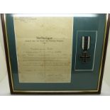 German WWI Iron Cross medal, mounted and framed with certificate