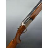 Barasingha 220 12 bore over and under ejector shotgun with engraved lock, top plate and underside,