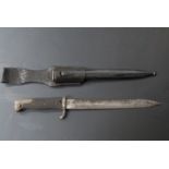 German KS98/ 02 style sawback bayonet, with leather grips, sweptback quillon and W.K & C maker's