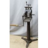 A vintage hand cranked iron milling machine, possibly for jewellery manufacturing, H121cm