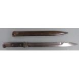 German S 1914 pattern sawback bayonet indistinctly marked Samson Werk to ricasso, with shaped wooden