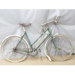 A vintage Raleigh ladies racing bicycle with leather Brooks saddle