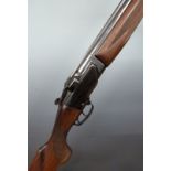 BRNO ZH 103 12 bore over and under ejector shotgun with chequered semi-pistol grip and forend,
