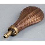 Copper and brass powder flask with reeded decoration to both sides, 20.5cm long.
