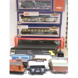 Twenty-four Hornby, Lima, BaCHmann and similar 00 gauge model railway locomotives, coaches and
