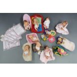 Eleven Ashton Drake Galleries resin baby dolls, largest 10cm tall, all with certificates.