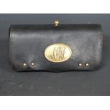 American Civil War era leather cartridge pouch with brass fittings including NG and McKenny & Co,