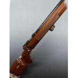 Valmet .22 bolt action target rifle with adjustable butt plate, cheek piece and trigger, shaped grip