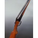 Baikal 430 16 bore side by side shotgun with engraved locks, trigger guard underside and top