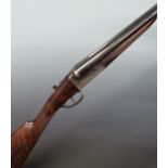 Victor Sarasqueta 12 bore side by side ejector shotgun with named and engraved locks, engraved