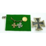 German WWI Iron Cross First Class 1914 medal, BH Mayer maker, together with miniatures and stick